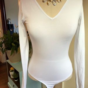 Pristine white bodysuit